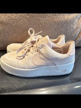 Nike Women’s Light Pink Suede Platform Sneakers